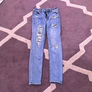 Navy ripped American eagle jeans